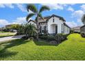 Charming single-story home features stone accents, lush lawn, and a well-manicured landscape at 2515 63Rd Ter E, Ellenton, FL 34222