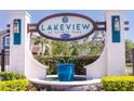 Elegant community sign reading Lakeview at Citrus Park with lovely water feature at 14245 Damselfly Dr, Tampa, FL 33625