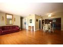 Spacious living and dining areas featuring hardwood floors and neutral wall colors at 1444 Eastfield Dr, Clearwater, FL 33764