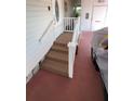 Inviting entrance with a ramp and stairs, providing easy access to the home's interior at 4851 W Gandy Blvd # 23C, Tampa, FL 33611