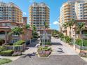 Stunning waterfront condo community with lush landscaping, gated entrance, and elegant architecture providing resort-style living at 555 5Th Ne Ave # 1032, St Petersburg, FL 33701