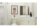 Bright bathroom featuring a shower and vanity, complemented by stylish decor at 9486 Gladsome Dr, Land O Lakes, FL 34637