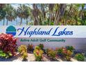 Entrance to Highland Lakes, an active adult golf community at 3053 Gregor Ct, Palm Harbor, FL 34684