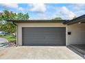 Spacious single car garage with sleek door and ample parking at 6875 11Th N Ave, St Petersburg, FL 33710