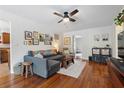 Bright living room showcasing hardwood floors and ample room for furnishings at 1408 Michigan Ave, Palm Harbor, FL 34683
