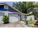 Charming single-Gathering home with a two-car garage and a well-maintained front yard at 2721 Baird Ct, Palm Harbor, FL 34684