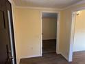 Inviting entryway with wood-look flooring, leading to a bright and airy space with neutral paint color at 3762 18Th S Ter, St Petersburg, FL 33711