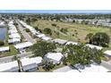 Aerial view of neighborhood homes near the golf course at 9690 41St N St # 0, Pinellas Park, FL 33782