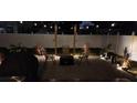 Backyard illuminated with string lights, creating a magical ambiance for evening gatherings at 6471 109Th N Ter, Pinellas Park, FL 33782