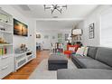 Bright living room featuring hardwood floors and modern decor at 1003 W Indiana Ave, Tampa, FL 33603