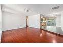 Open living space with hardwood floors and ample room for entertainment and relaxation at 12019 106Th Ct, Largo, FL 33778