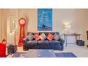 Comfortable living room featuring nautical themed decor and stylish furnishings at 1230 S Missouri Ave # 704, Clearwater, FL 33756