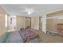 Large bedroom with closet, bathroom view, and lots of space at 1506 E Poinsettia Ave, Tampa, FL 33612