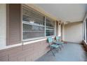 Covered porch with seating area perfect for relaxing outdoors at 3547 Odom Dr, New Port Richey, FL 34652