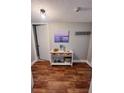 Inviting entryway featuring a decorative console table with coastal accents and wood-look flooring at 51 Island Way # 309, Clearwater Beach, FL 33767