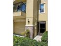 Two-story townhouse featuring a balcony, stone accents, and well-maintained landscaping at 5529 White Marlin Ct, New Port Richey, FL 34652