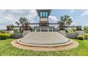 Welcoming entrance to Summerstone community with elegant signage and water feature at 33922 Jasper Stone Dr, Wesley Chapel, FL 33543