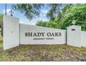 Shady Oaks Resident Owned community entrance sign with manicured landscaping at 3542 Castle Dr, Zephyrhills, FL 33540