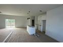 Bright living room showcasing natural light and an open floor plan at 12167 Florence Ave, Port Charlotte, FL 33981