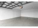 View of the spacious garage with neutral colors and smooth floors at 501 Knights Run Ave # 5103, Tampa, FL 33602