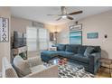 Inviting living room featuring a comfortable sectional sofa, stylish decor, and lots of natural light at 607 S Albany Ave # 1, Tampa, FL 33606