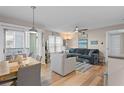 Inviting living room featuring a comfortable sectional sofa, stylish decor, and lots of natural light at 607 S Albany Ave # 1, Tampa, FL 33606