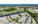 Excellent aerial shot of a waterfront property near Tampa Bay in a neighborhood of similar homes surrounded by waterways at 110 Aberdeen Pond Dr, Apollo Beach, FL 33572