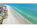 Expansive shoreline with turquoise ocean waves and beachfront condos at 17920 Gulf Blvd # 208, Redington Shores, FL 33708