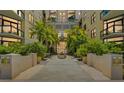 Condominium entrance with water feature and lush, mature plantings in a bright, airy setting at 400 4Th S Ave # 508, St Petersburg, FL 33701