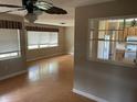 View of the living room leading into the kitchen space at 5991 42Nd N Ave, St Petersburg, FL 33709