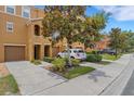 Charming two-story townhome with well-maintained landscaping, spacious driveways and sidewalks at 9013 White Sage Loop, Lakewood Ranch, FL 34202