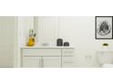 A stylish bathroom features a modern vanity, neutral finishes and ample storage space at 11909 Brae Way, Dade City, FL 33525