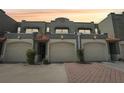 Charming townhouse with a two-car garage, elegant tile roof, and nicely manicured landscaping at 2914 W Gandy Blvd # C, Tampa, FL 33611