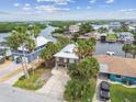 Waterfront homes with mature palm trees, offering stunning views, and convenient boating access at 3285 Minnow Creek Dr, Hernando Beach, FL 34607