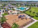 Overhead view of the community park and pool area, showcasing playground and recreational amenities at 7211 Ronnie Gardens Ct, Tampa, FL 33619