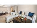 Inviting living room with plush sectional sofa and modern decor; perfect for relaxation and entertaining at 801 Russell Ln # 252, Brandon, FL 33510