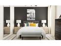Sophisticated main bedroom featuring modern lamps, monochrome decor, and neutral-colored furnishings at 8064 Painted Sky Pl, Land O Lakes, FL 34637