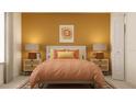 Cozy bedroom featuring warm colors, bedside lamps, and decorative pillows for a welcoming ambiance at 9332 Cannon Beach Dr, Parrish, FL 34219