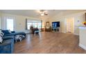 Spacious living room with high ceilings, wood floors and ample natural light at 3642 Fantasy Way, Brooksville, FL 34604