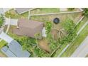 Aerial view of property showcasing backyard, surrounding neighborhood, and proximity to roads at 9712 White Barn Way, Riverview, FL 33569