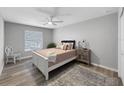Cozy bedroom with a plush rug, chair, and dresser, offering a relaxing and inviting atmosphere at 10011 46Th W Ave, Bradenton, FL 34210