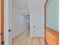 Bright entryway featuring hardwood floors, white walls and a modern wood door at 1801 N Morgan St # 5, Tampa, FL 33602