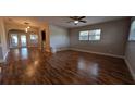 Open-concept living room features hardwood flooring and plenty of natural light at 4021 19Th N St, St Petersburg, FL 33714