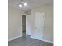 Bright bedroom with tiled floors, ceiling fan, and closet at 4611 17Th N Ave, St Petersburg, FL 33713