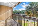 Enjoy serene waterfront views from this home's private balcony at 6309 Newtown Cir # 9B2, Tampa, FL 33615