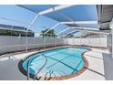 Sparkling screened-in pool with a relaxing backyard view and ample deck space at 7607 22Nd W Ave, Bradenton, FL 34209