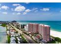 Beautiful coastal community featuring condo buildings, beach access, and waterway views at 1310 Gulf Blvd # 6C, Clearwater Beach, FL 33767