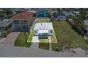Aerial view showcasing the property boundaries of a cozy home, ready for you to make it your own at 13124 4Th E St, Madeira Beach, FL 33708