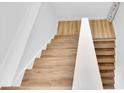 Bright staircase featuring light wood steps and white risers at 2807 57Th S St, Gulfport, FL 33707