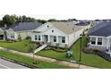 Attractive single-story home with a manicured lawn and stone-detailed pillars at 28547 Hillcrest Valley Blvd, Wesley Chapel, FL 33543